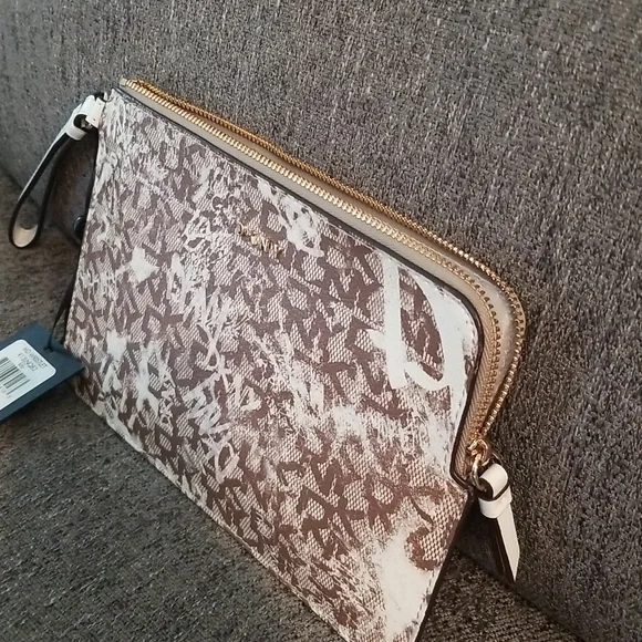 Nwt DKNY medium brown graffiti wristlet. Retails $78 - Picture 6 of 8